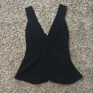 Black peplum top with full zipper back